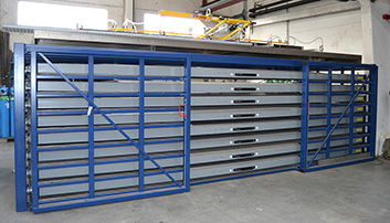 Storage for loading and unloading sheet metal on seperate sided